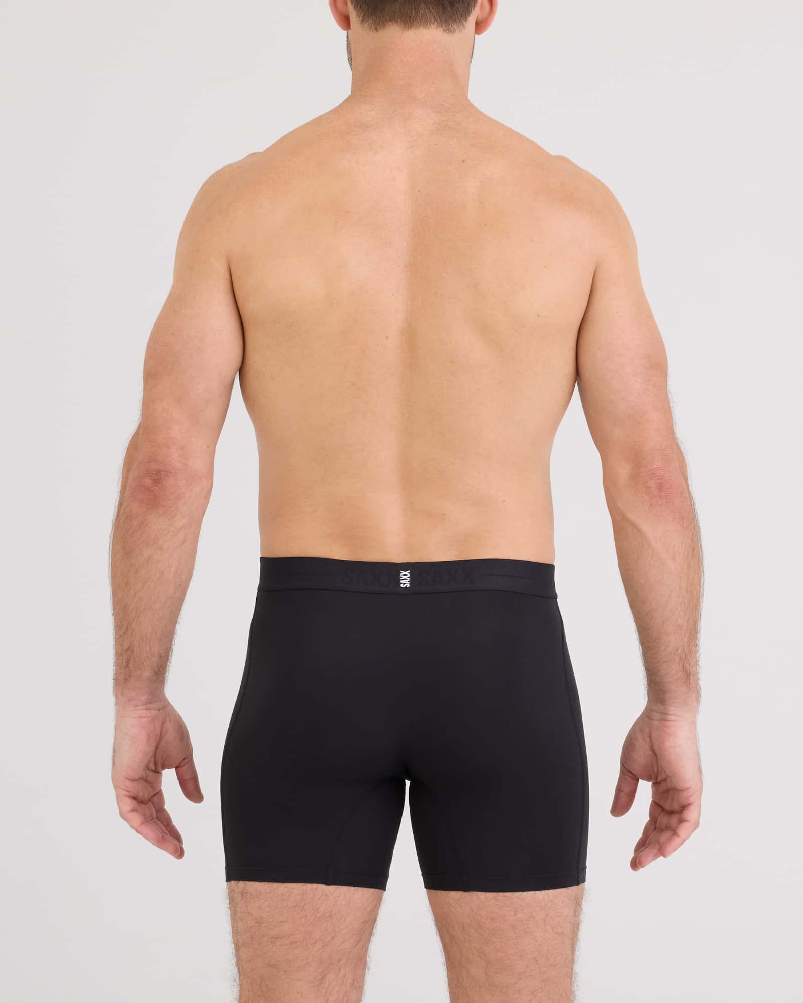 Back - Model wearing Smooth Luxe Micro Modal Boxer Brief in Black