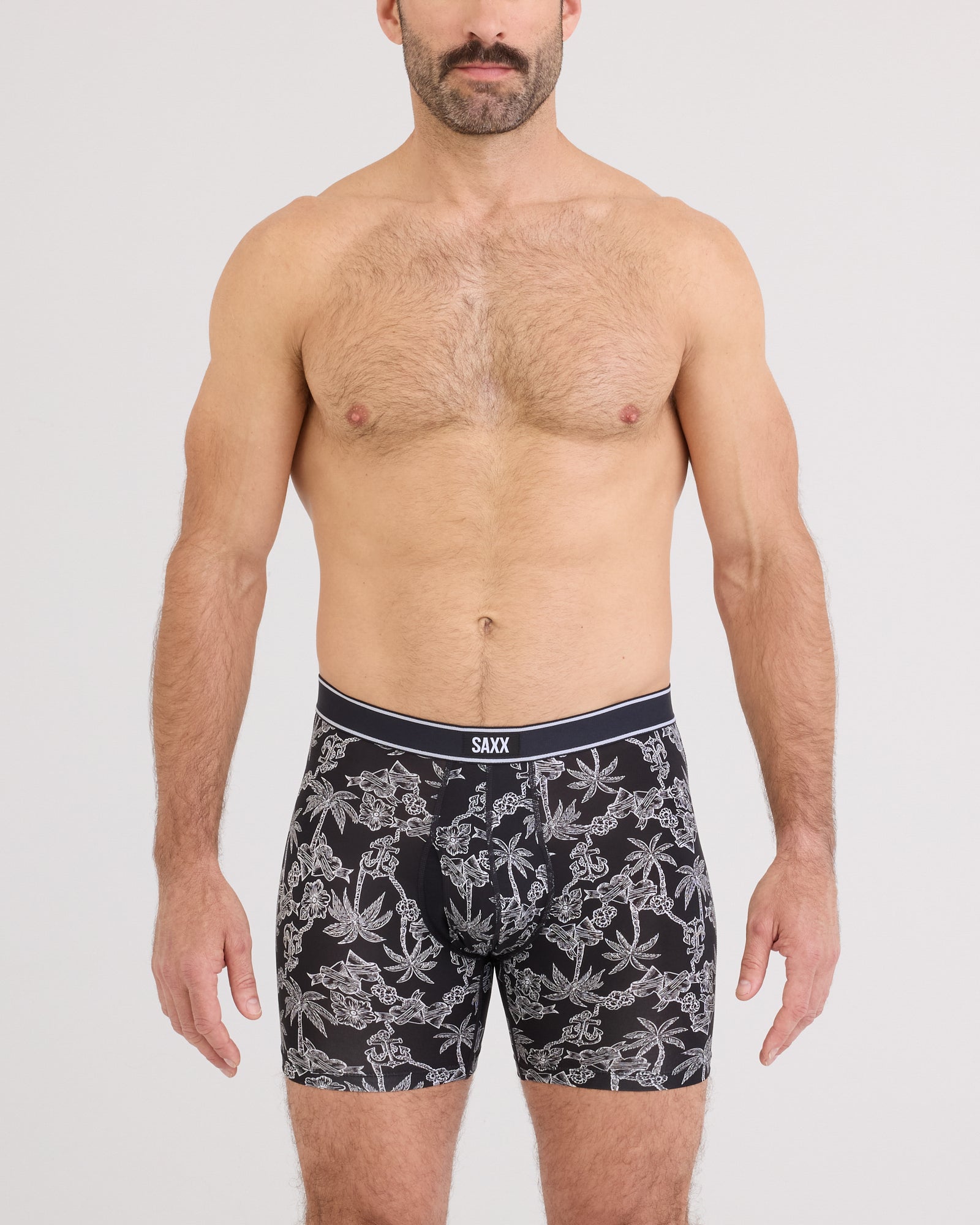 Front - Model wearing Daytripper Comfort Stretch Boxer Brief Fly in Tropical Tattoo-Black