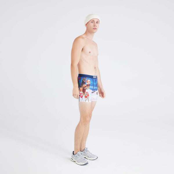 Front - Model wearing Volt Breathable Mesh Boxer Brief in Dogs Of Saxxmas-Blue