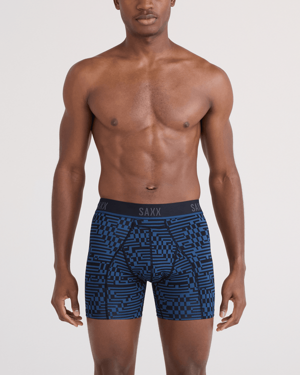Front - Model wearing Kinetic Light-Compression Mesh Boxer Brief in Maze Camo-Navy Dawn
