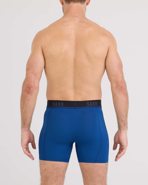Back - Model wearing Kinetic Light-Compression Mesh Boxer Brief in Navy Dawn