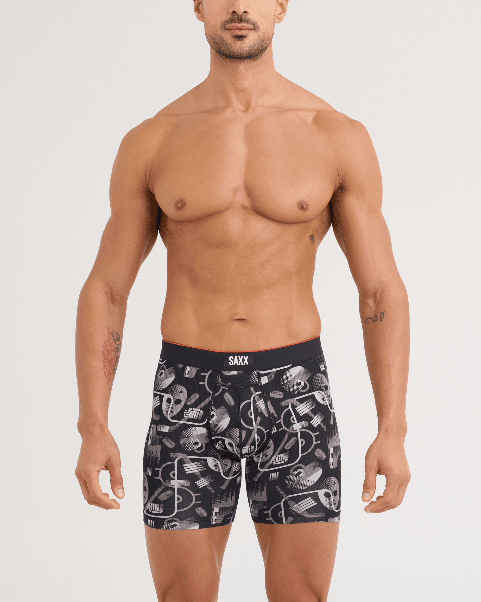 Front - Model wearing Multi-Sport Mesh Boxer Brief in Hockey Conduit-Black