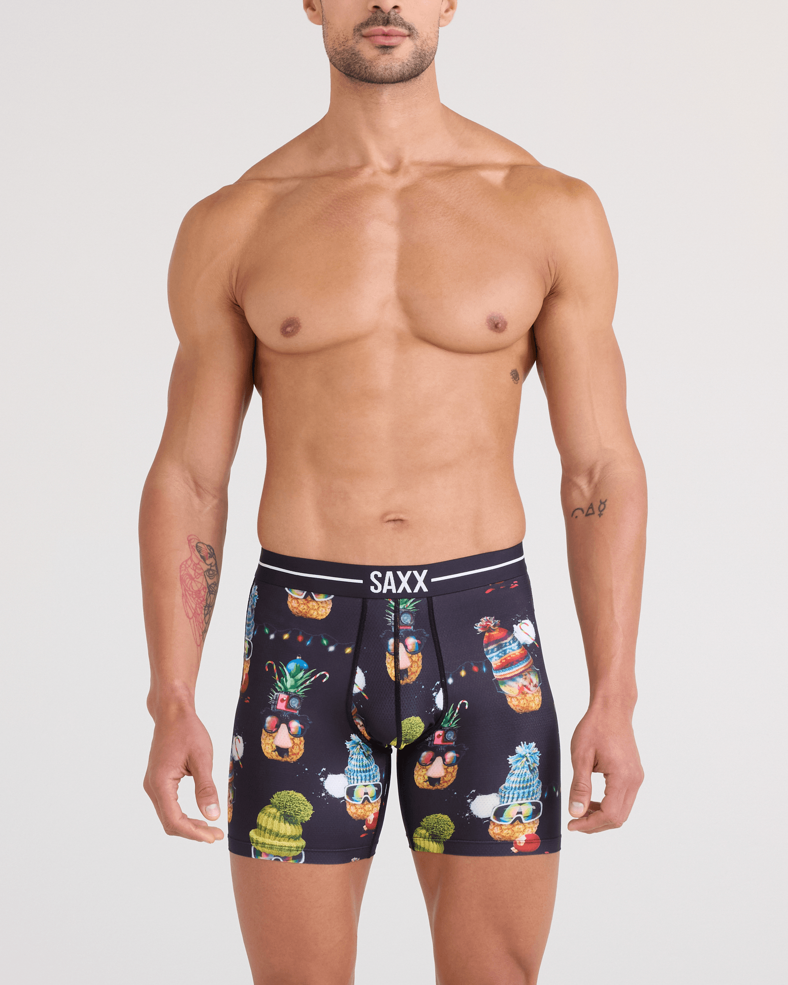 Front - Model wearing Volt Breathable Mesh Boxer Brief in Deck The Pineapples-Black