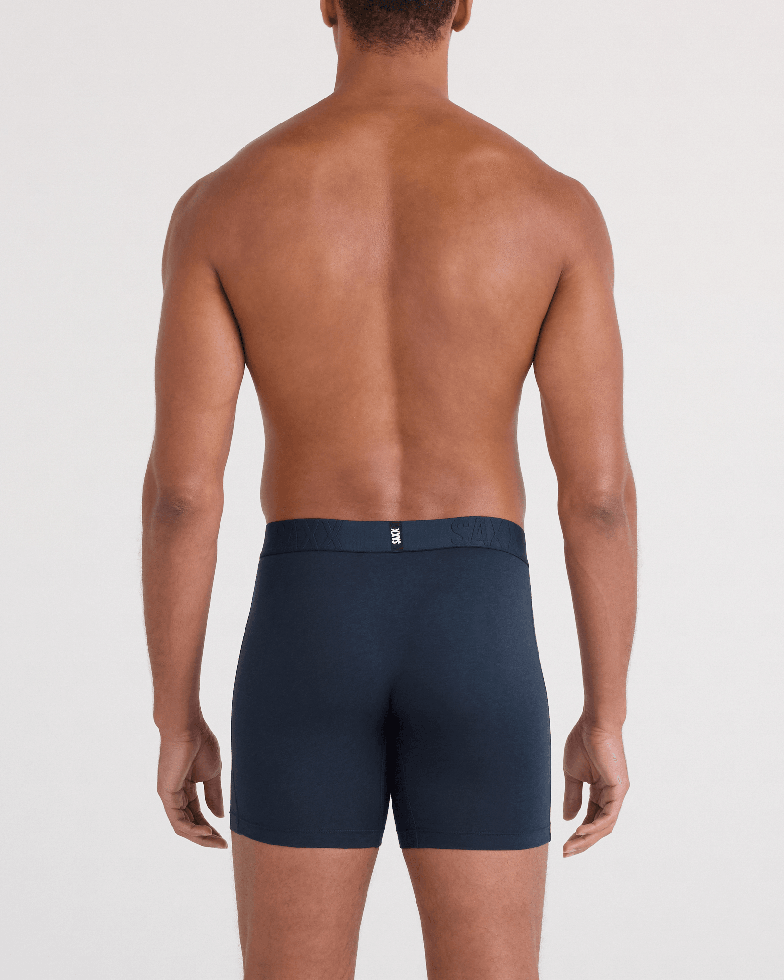 Back - Model wearing DropTemp Cooling Cotton Boxer Brief Fly in Dark Ink