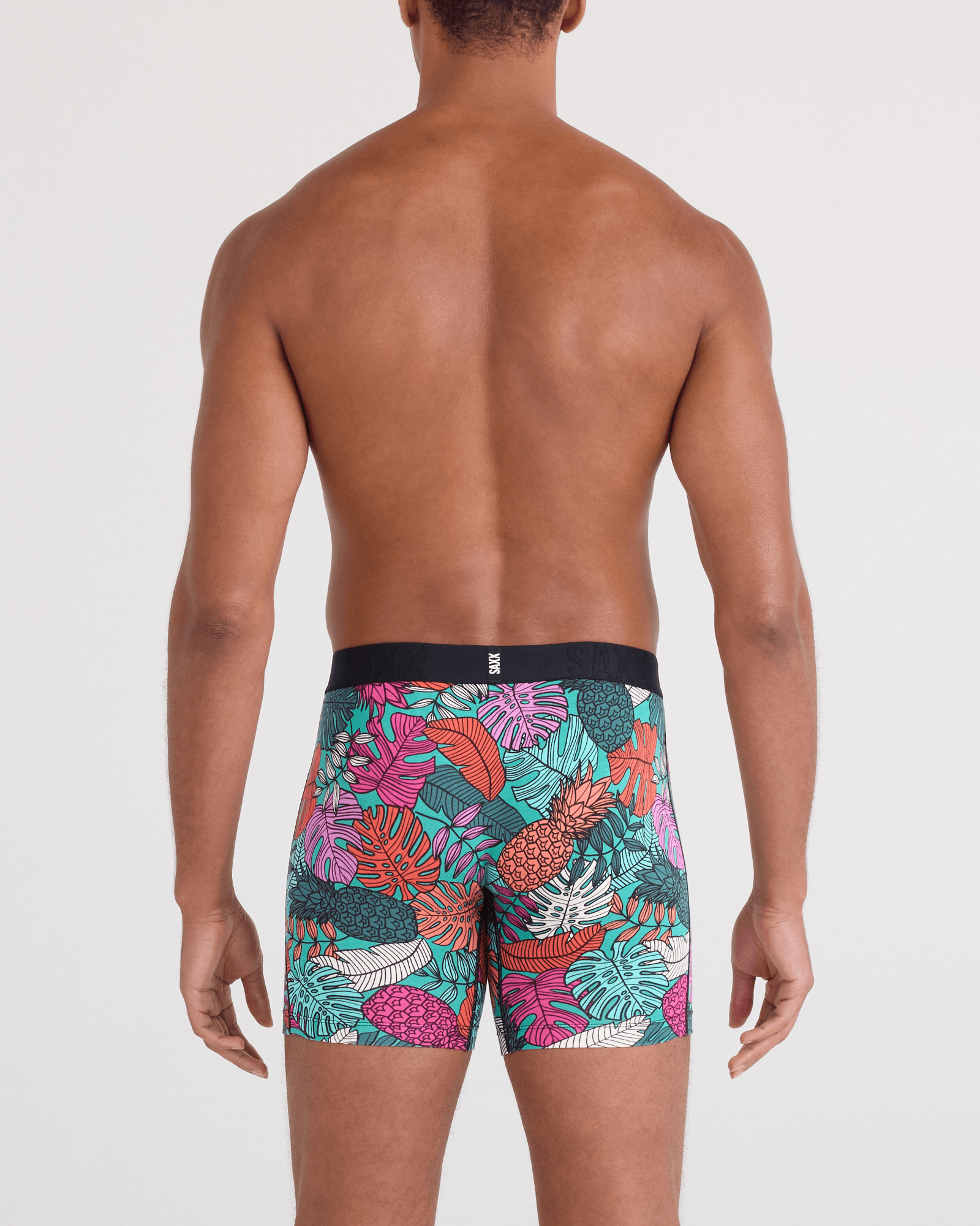 Back - Model wearing DropTemp Cooling Cotton Boxer Brief Fly in Fruity Palm-Aqua
