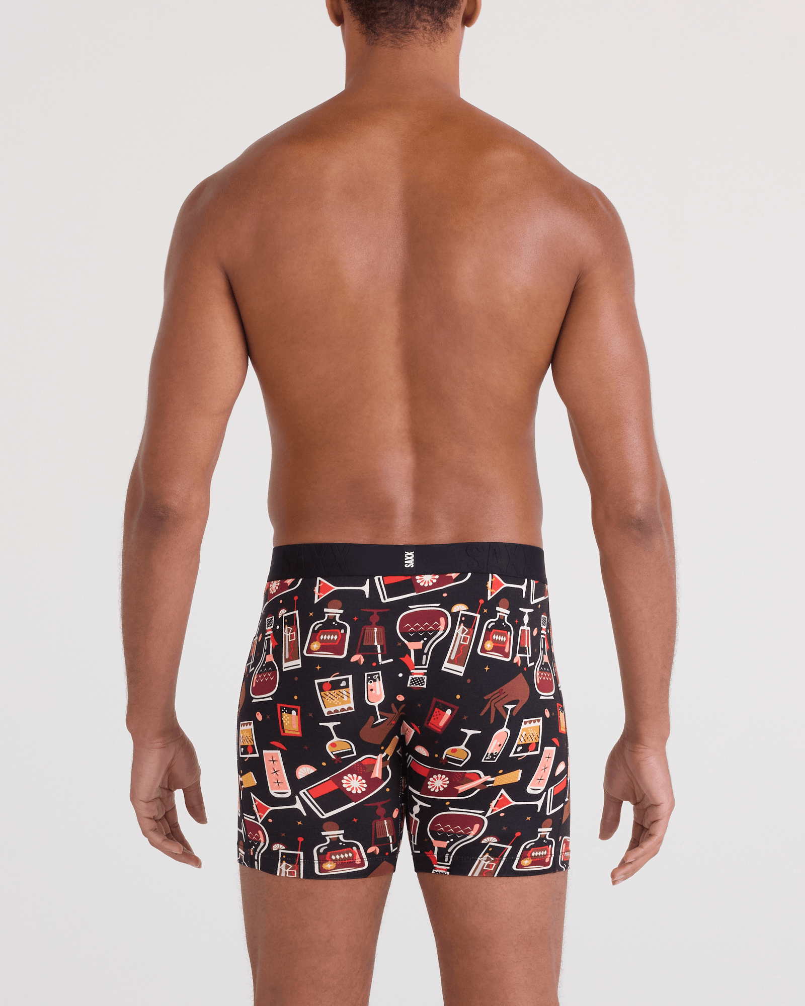 Back - Model wearing DropTemp Cooling Cotton Boxer Brief Fly in Host With The Most-Black