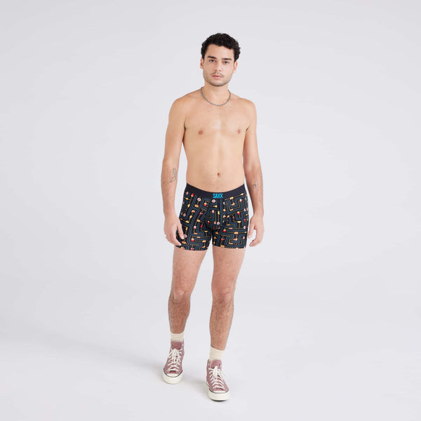 Front - Model wearing Vibe Super Soft Boxer Brief in Junk Man-Black