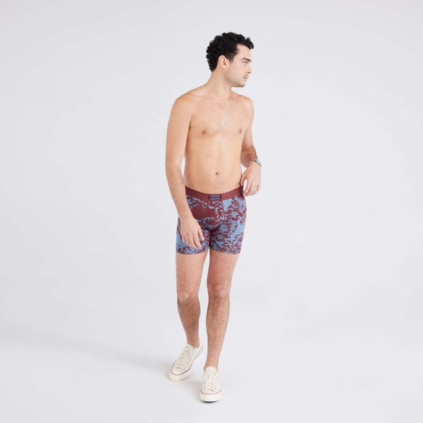 Front - Model wearing Vibe Super Soft Boxer Brief in Shadow Tropics-Andorra