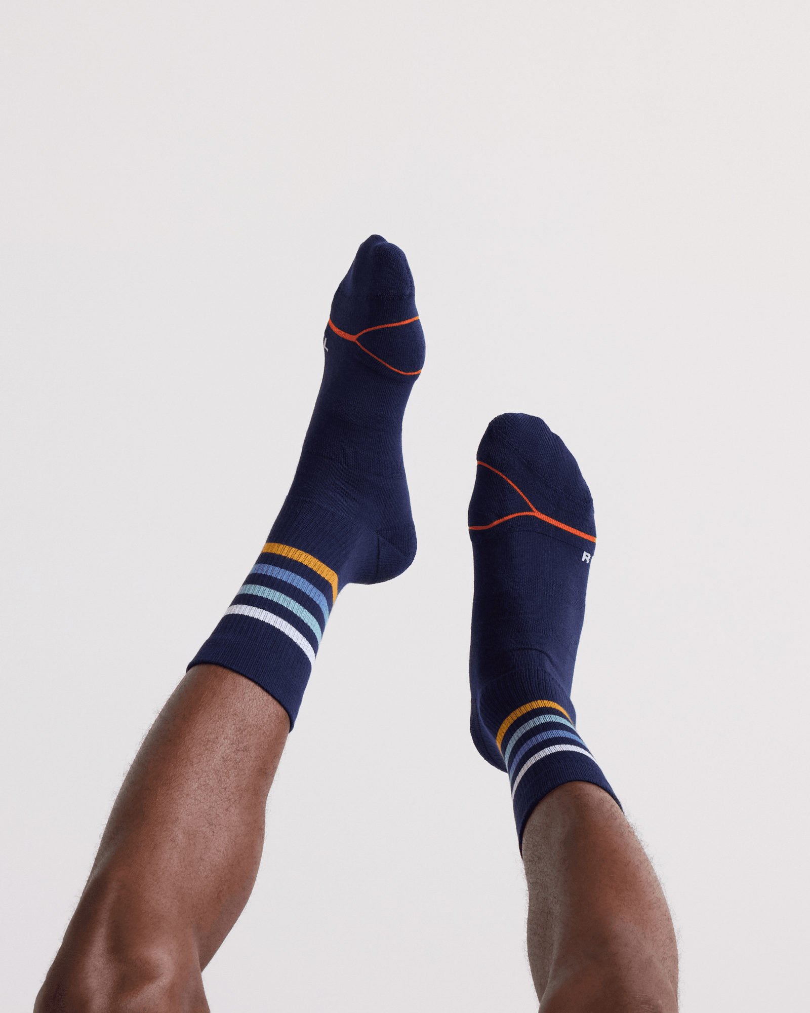 Back - Model wearing Good Form Crew Sock in Blue Bold Stripe
