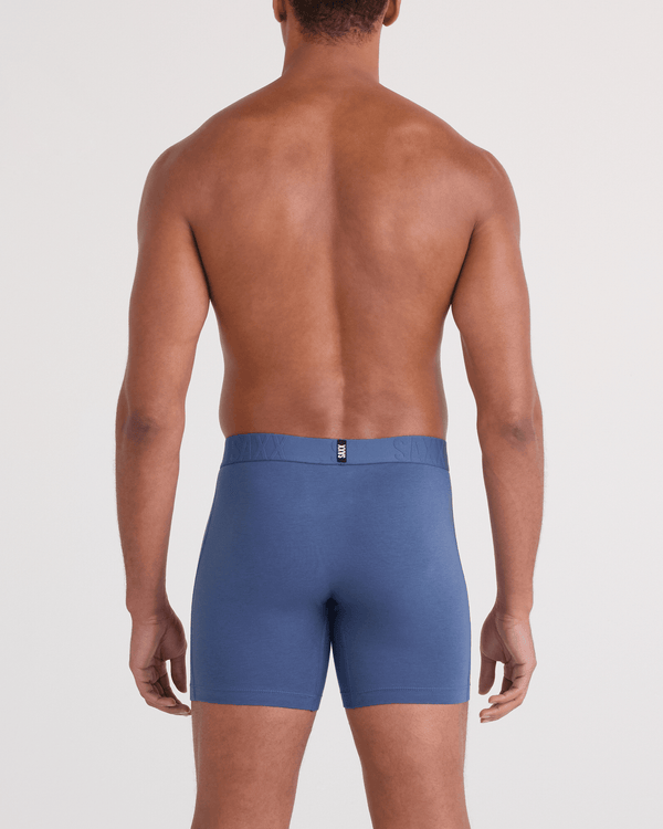 Back - Model wearing DropTemp Cooling Cotton Boxer Brief Fly 3 Pack in Red/Indigo/Dark Ink
