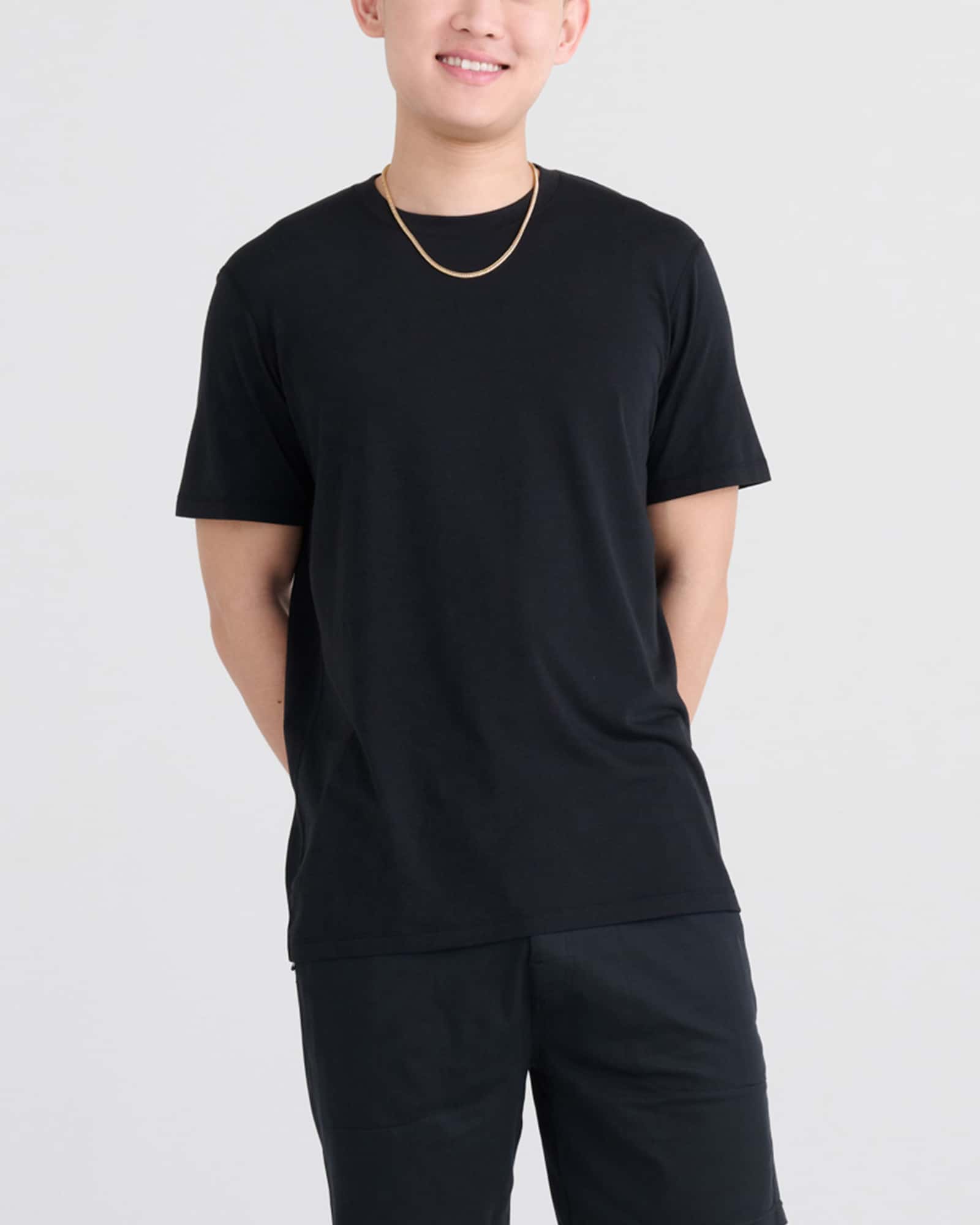 Front - Model wearing Droptemp Cooling Cotton Tee in Black