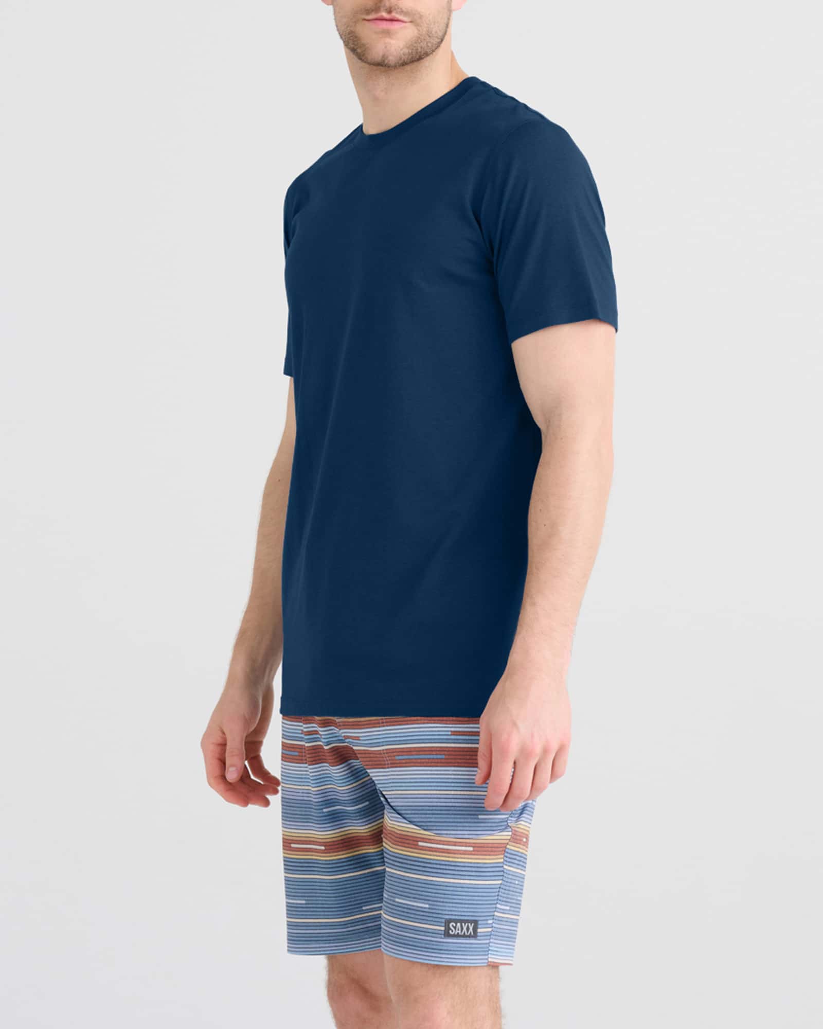 Front - Model wearing Droptemp Cooling Cotton Tee in Dark Denim