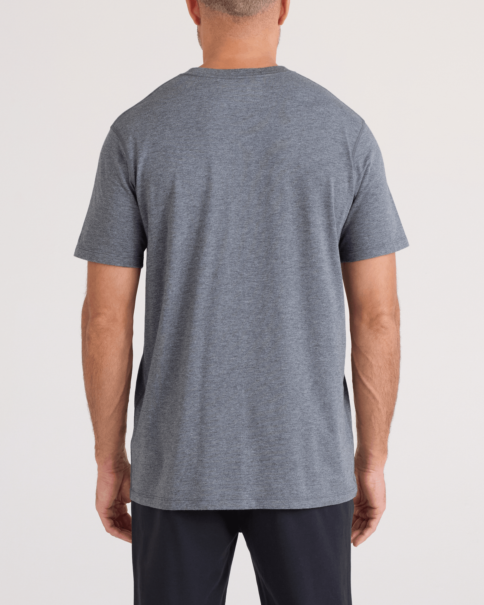 Back - Model wearing DropTemp Cooling Cotton Tee in Turbulence Heather
