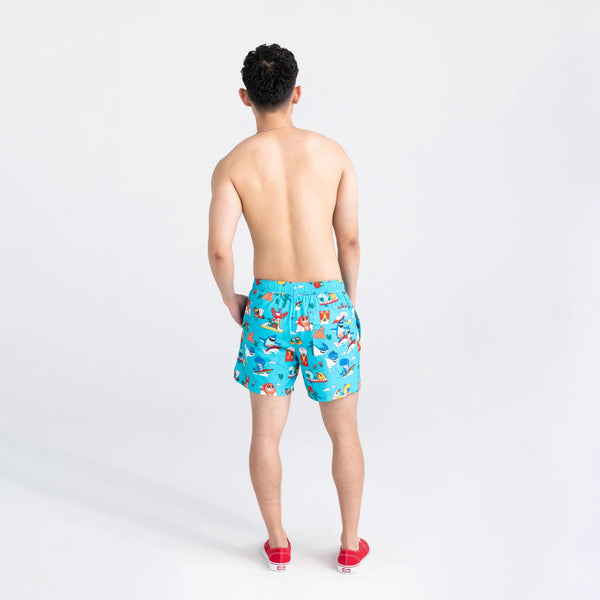 Back - Model wearing Oh Buoy 2N1 Swim Volley Short 5" in Water Whirled- Blue