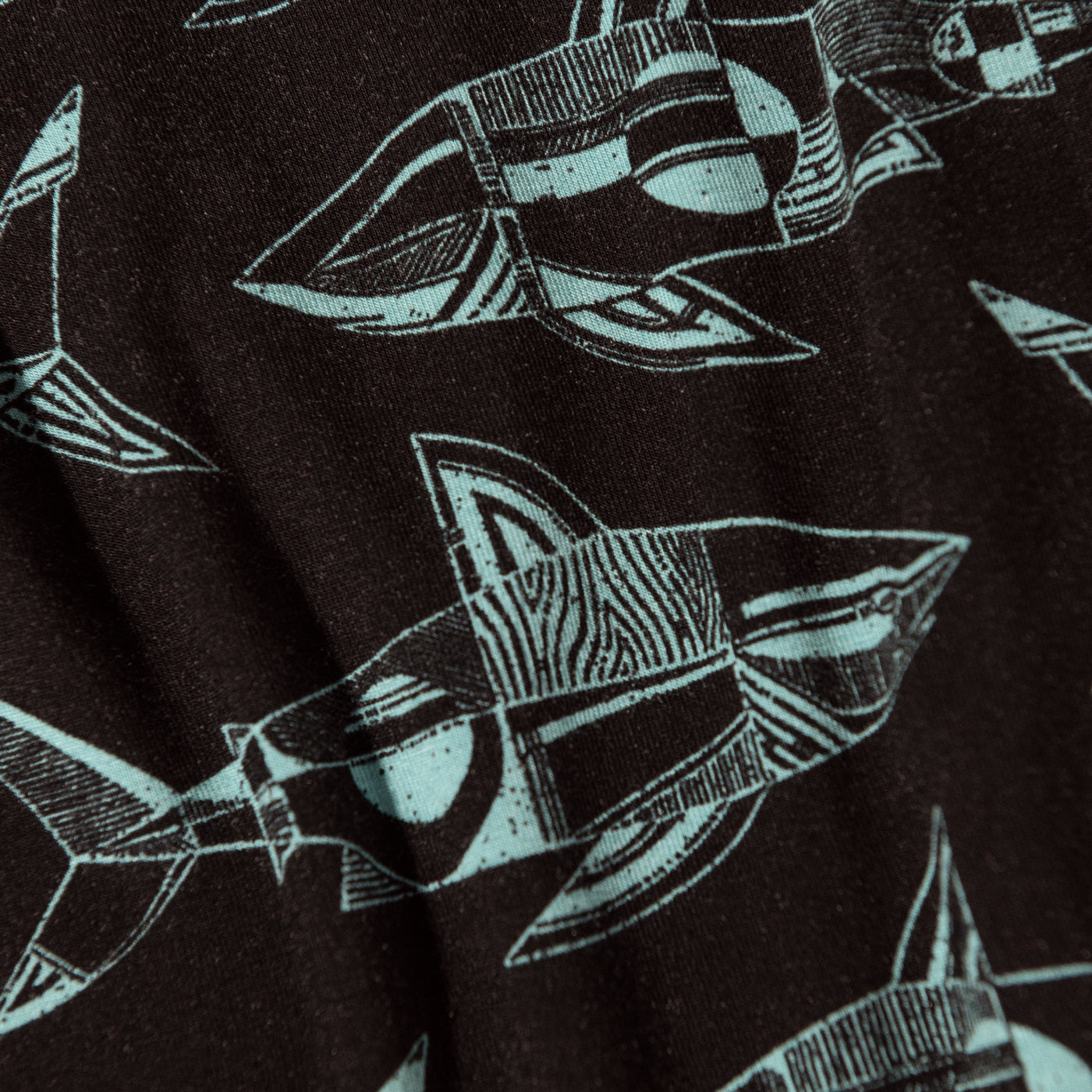 Clock up photo of black boxer briefs in a shark print