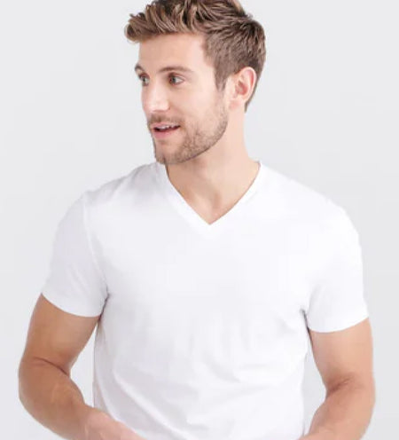 Man wearing a white cooling v-neck undershirt