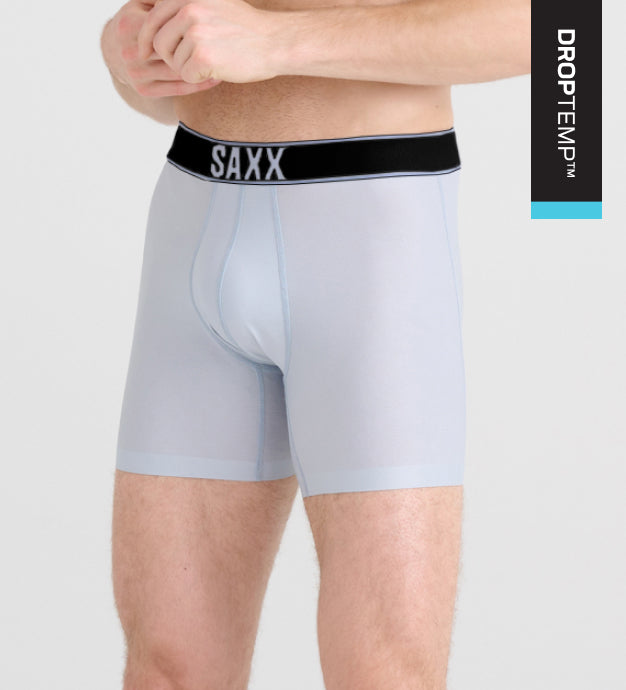 DropTemp™ logo overlaying a photo of a man in white cooling aquatic Boxer Briefs