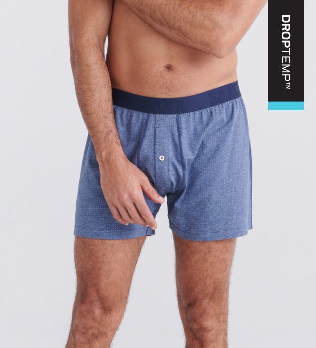 DropTemp™ logo overlaying a photo of a man in blue cooling Boxer Shorts