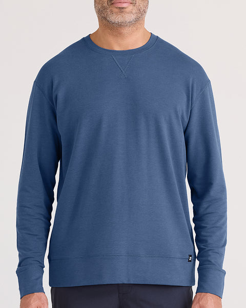 Man wearing a blue sweatshirt on a white background