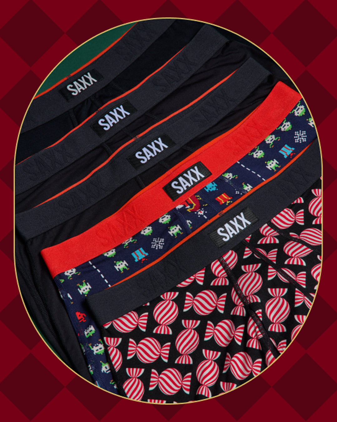 Set of SAXX underwear with various patterns on a red background