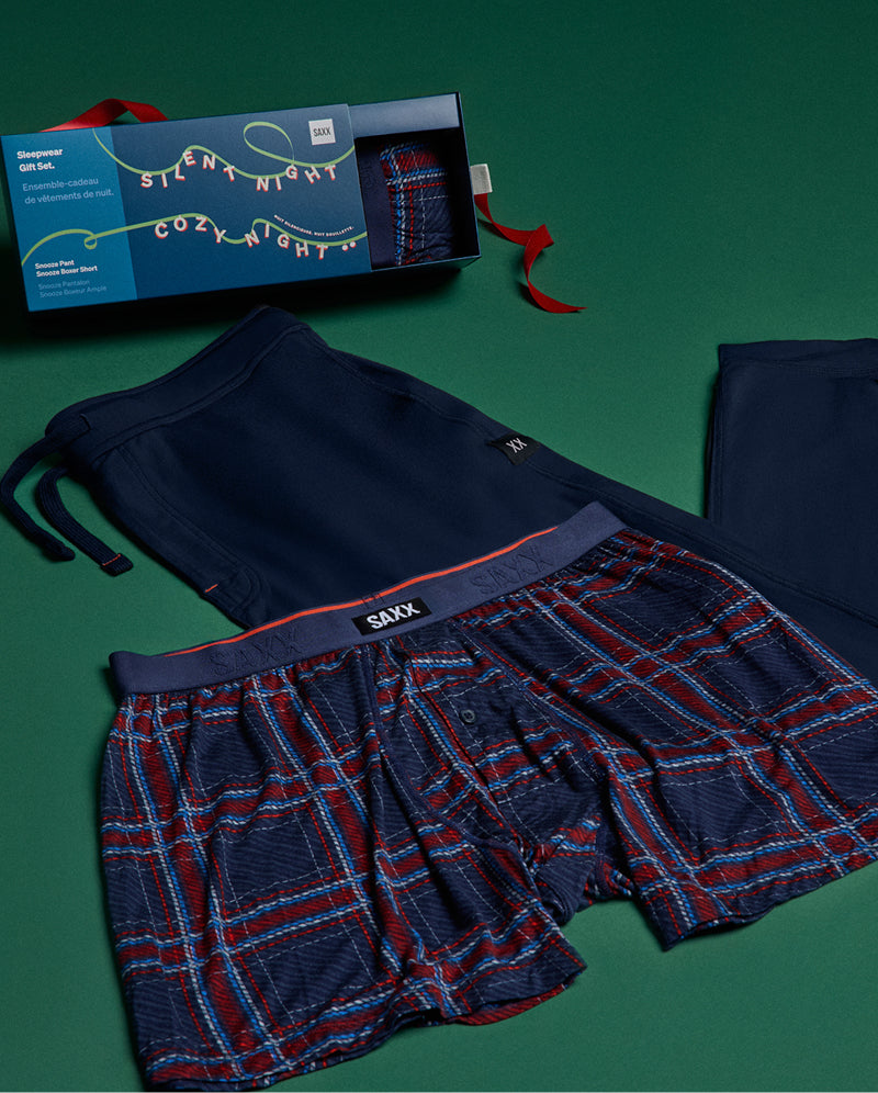 Lounging gifts laid out on a green backdrop