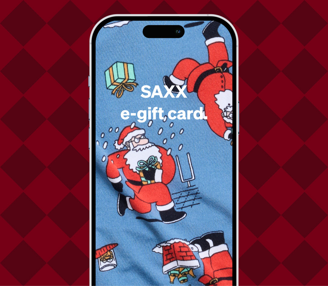 Phone case with Santa Claus design and SAXX branding on a red and black checkered background