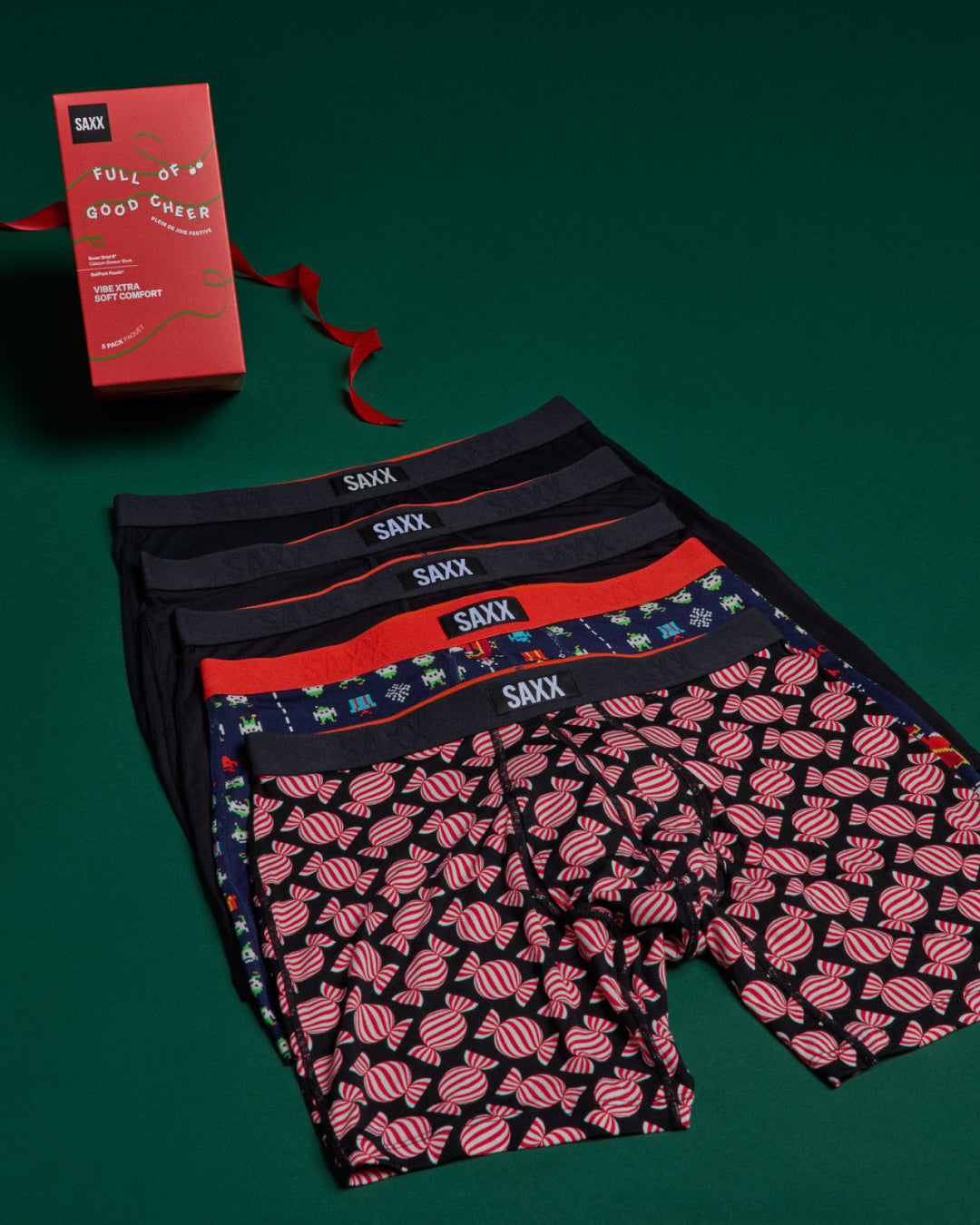 SAXX underwear with candy pattern on a green background