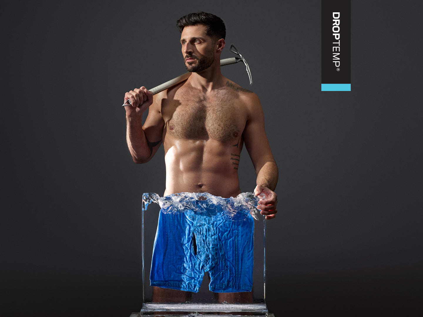 Man holding a pickaxe with ice on his waist, wearing blue underwear, against a dark background with Droptemp branding.