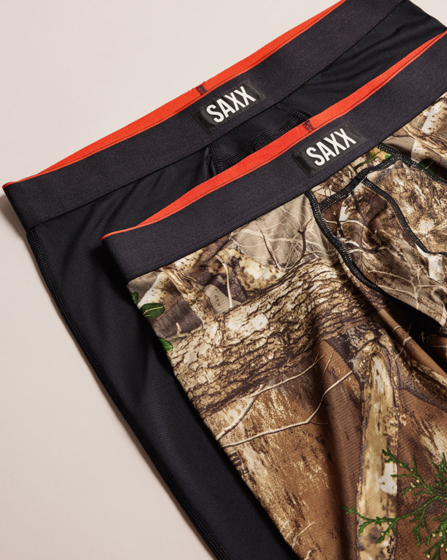 Camouflage underwear with SAXX waistband on a beige background