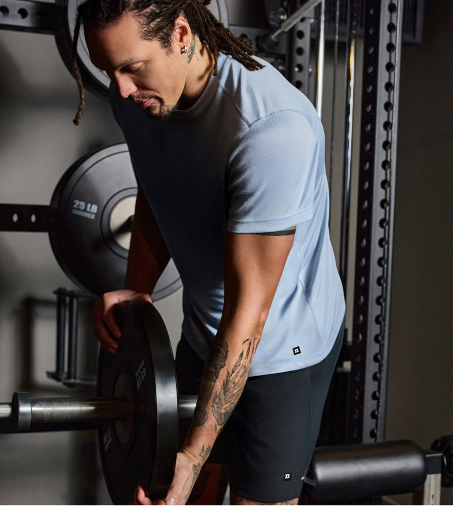 SAXX Gamechanger and Professional Basketball Player Aaron Gordon lifting weights in a gym setting