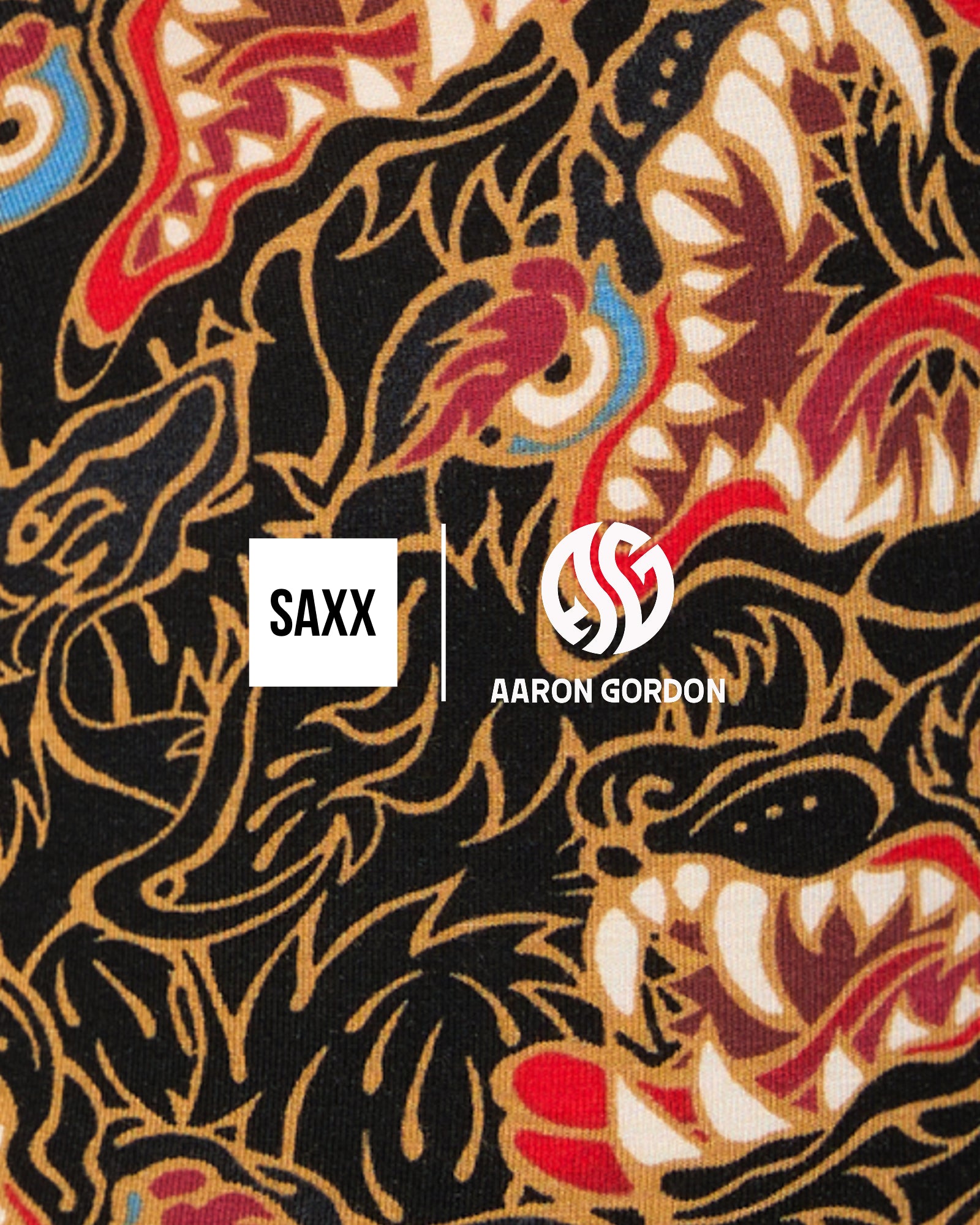 SAXX x Aaron Gordon graphic featuring a bold dragon-inspired print in black, gold, and red tones.