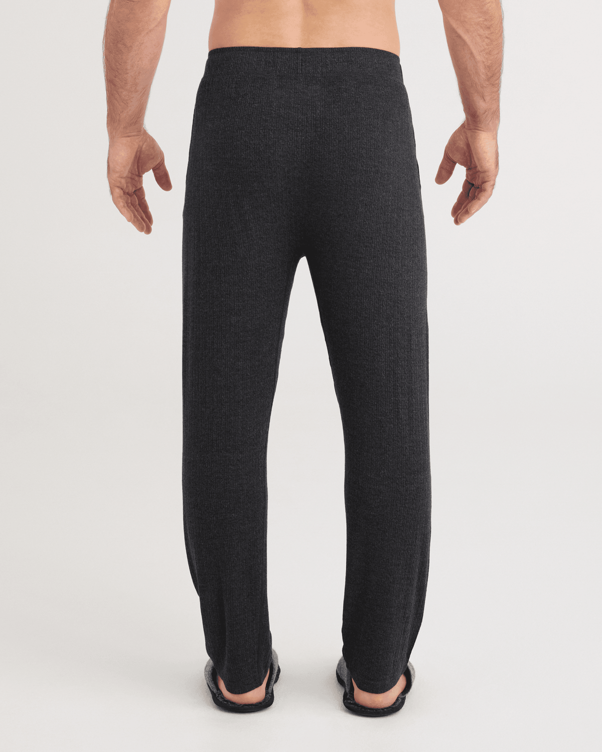 Back - Model wearing Snooze Cabin Luxe Pants in Washed Black Heather