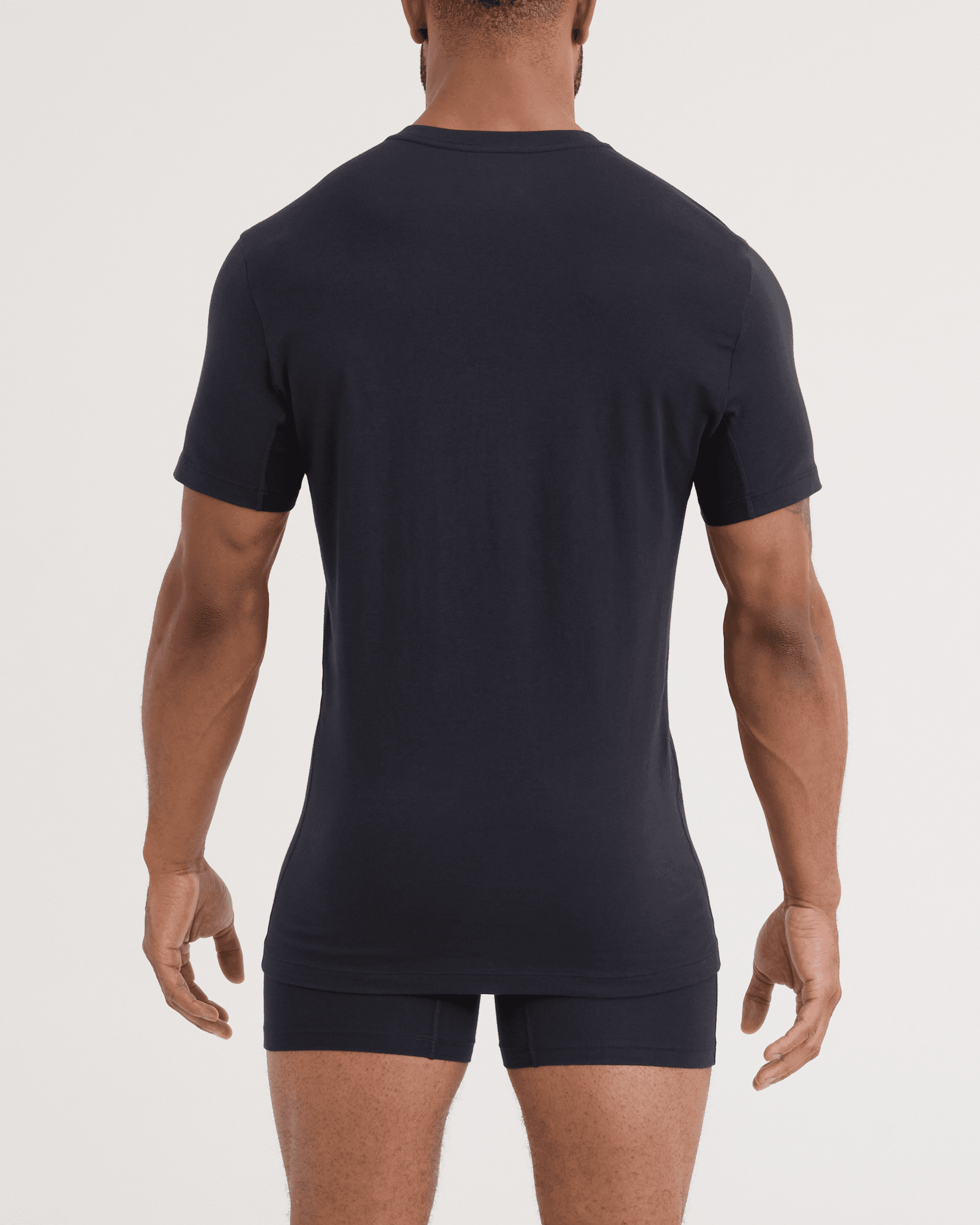 Back - Model wearing DropTemp Dry Cotton Short Sleeve V-Neck 2 Pack in Black