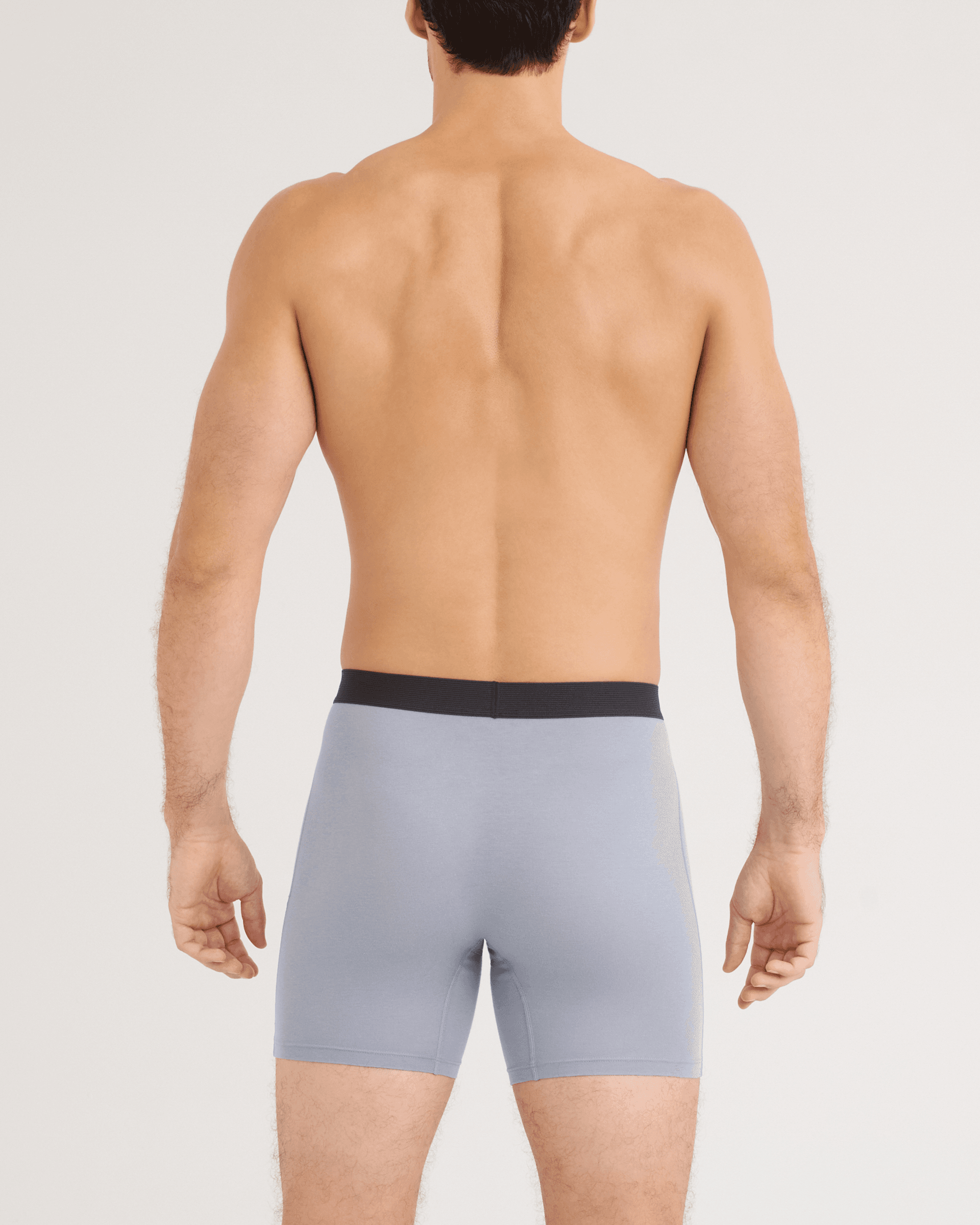 Back - Model wearing 24Seven Cotton Boxer Brief 3 Pack in Tradewinds/Navy/Black