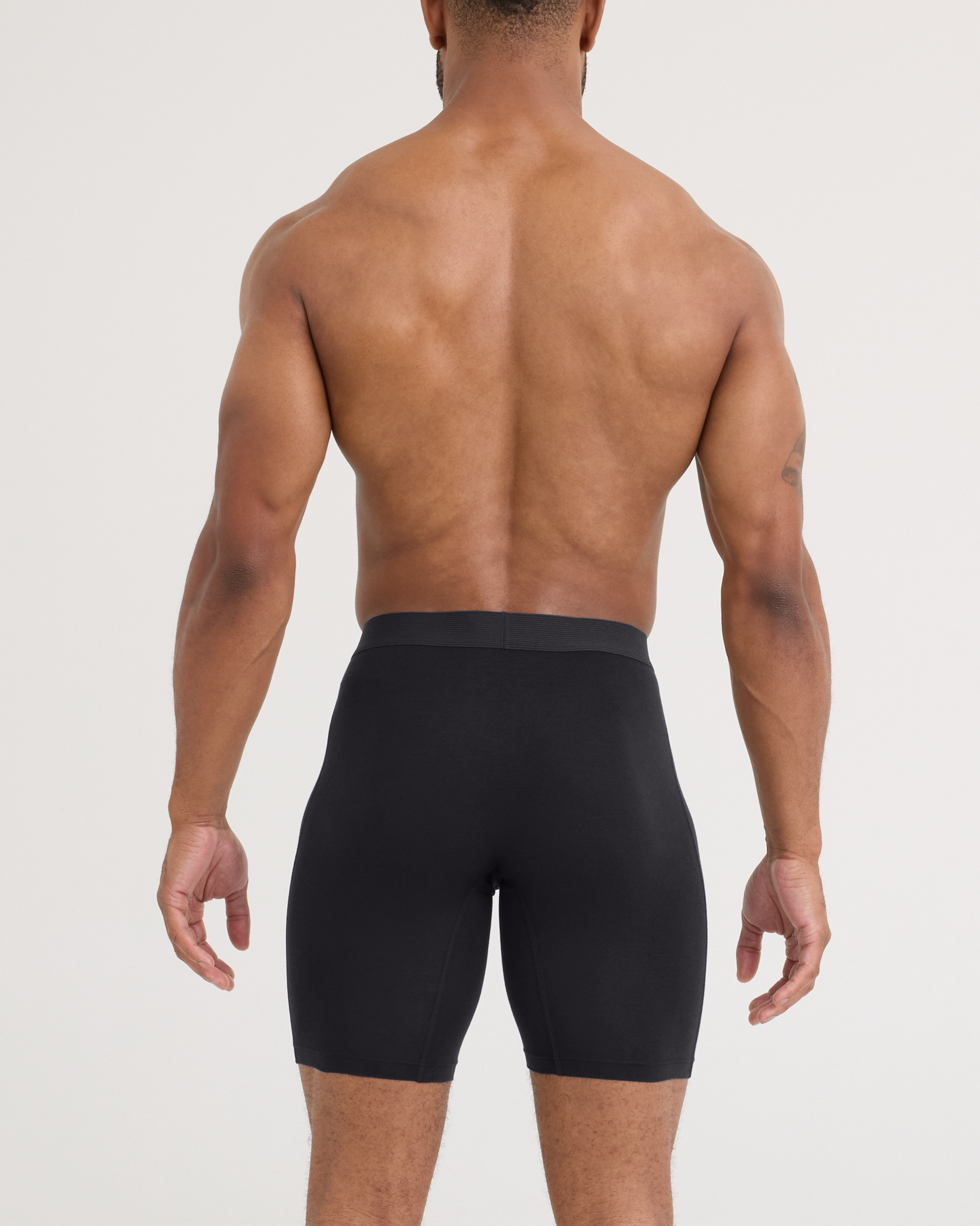 Back - Model wearing 24Seven Cotton Long Leg 3 Pack in Black