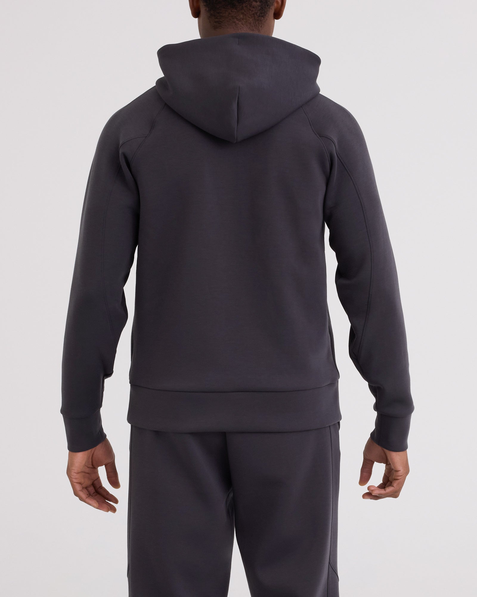 Back - Model wearing Phase Full Zip Hoodie in Faded Black