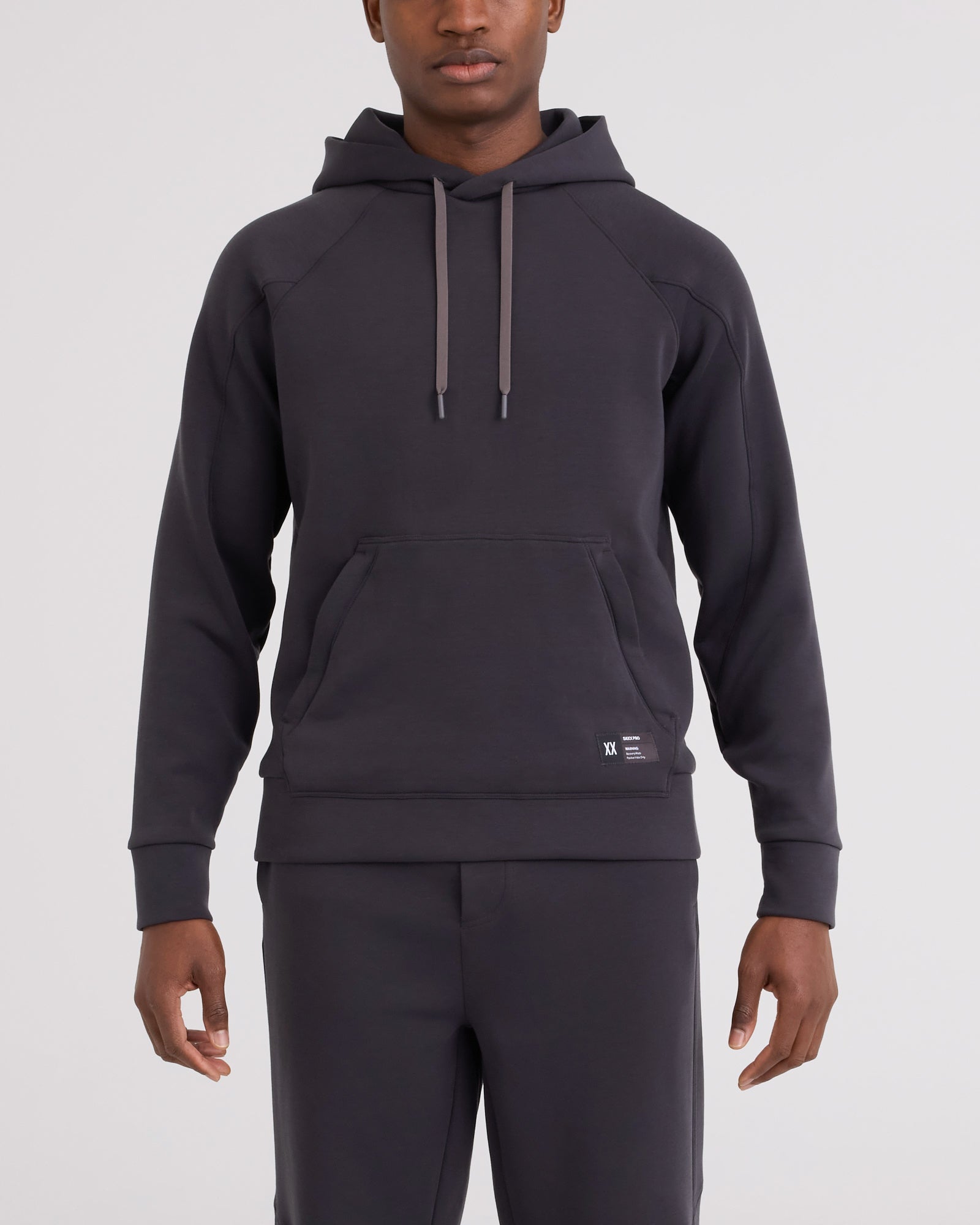Front - Model wearing Phase Hoodie in Washed Indigo