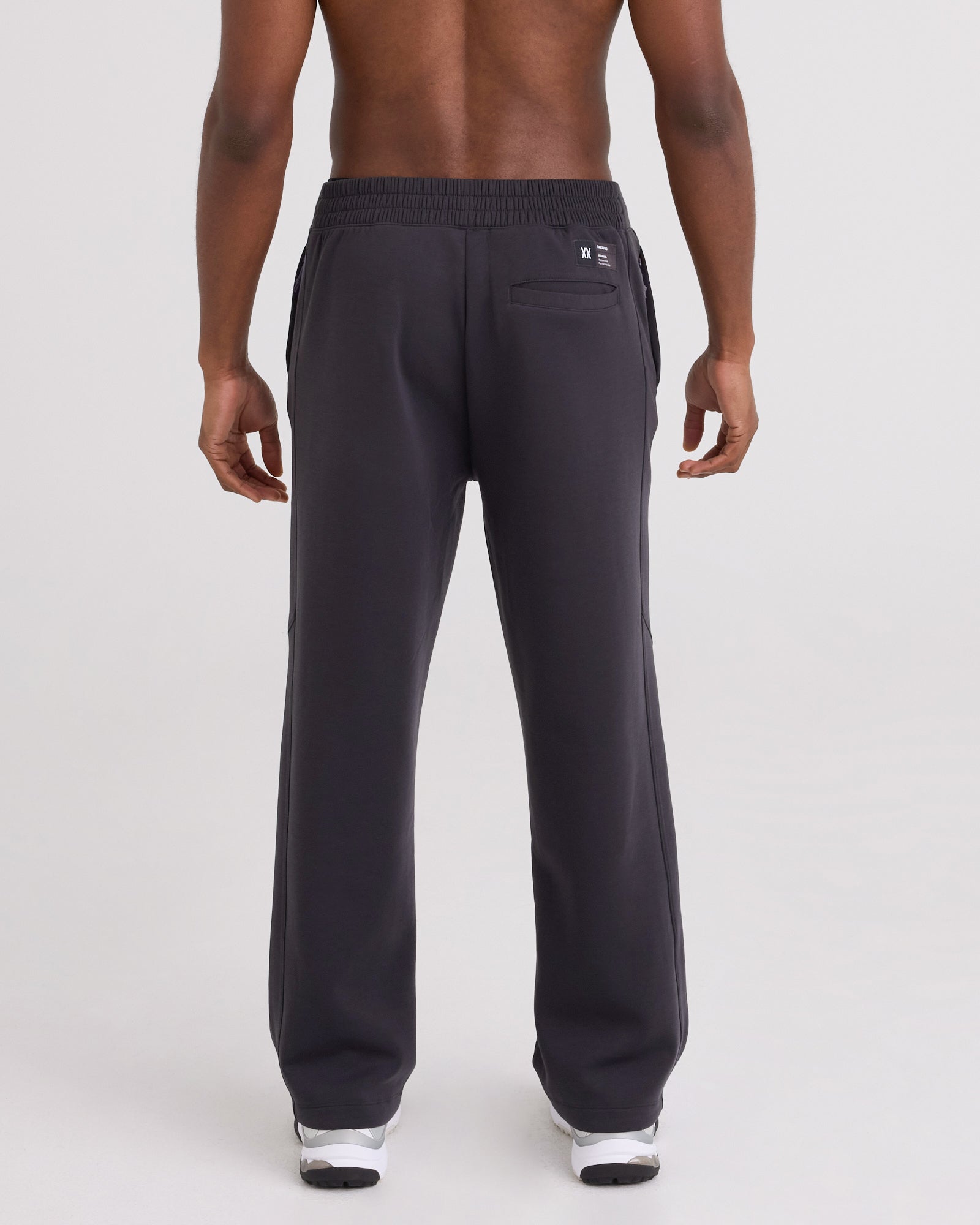 Back - Model wearing Phase Pants in Faded Black