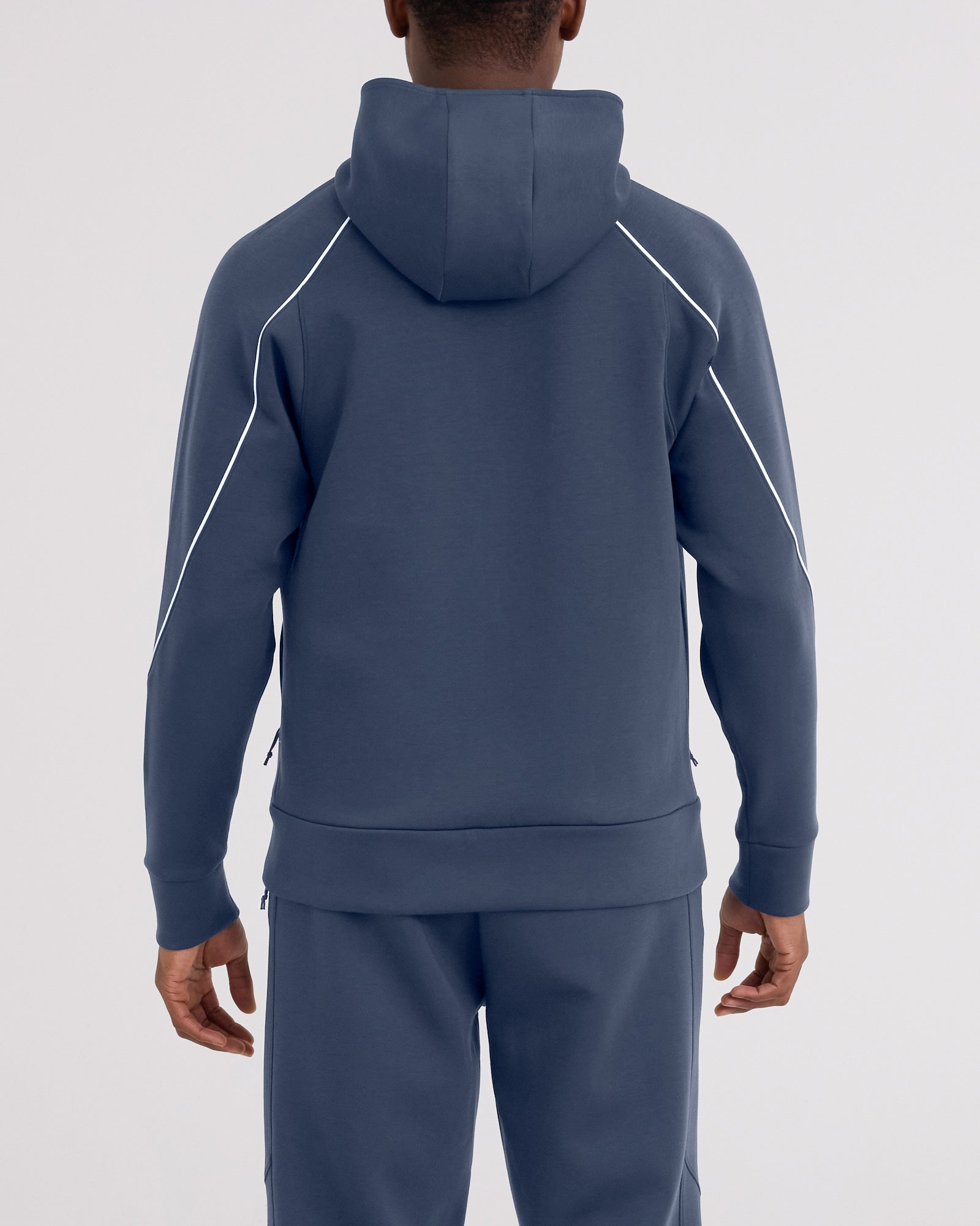 Back - Model wearing Phase Full Zip Hoodie in Washed Indigo