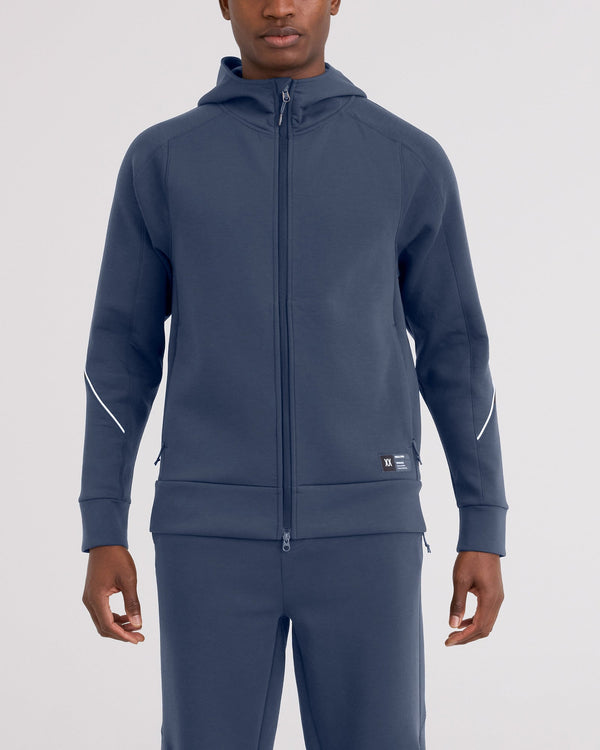 Front - Model wearing Phase Full Zip Hoodie in Washed Indigo