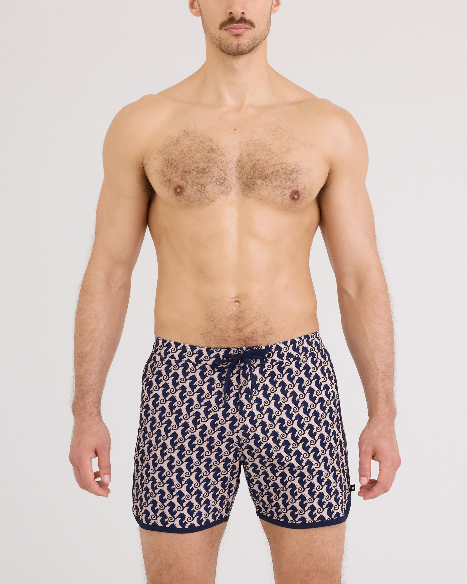 Front - Model wearing Harbormaster 2N1 Trunk 5" in Seahorse Chain-Light Coral