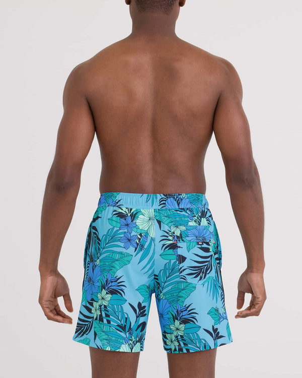 Back - Model wearing Oh Buoy 2N1 Volley - Brief Liner 7" in Hibiscus Jungle-Blue
