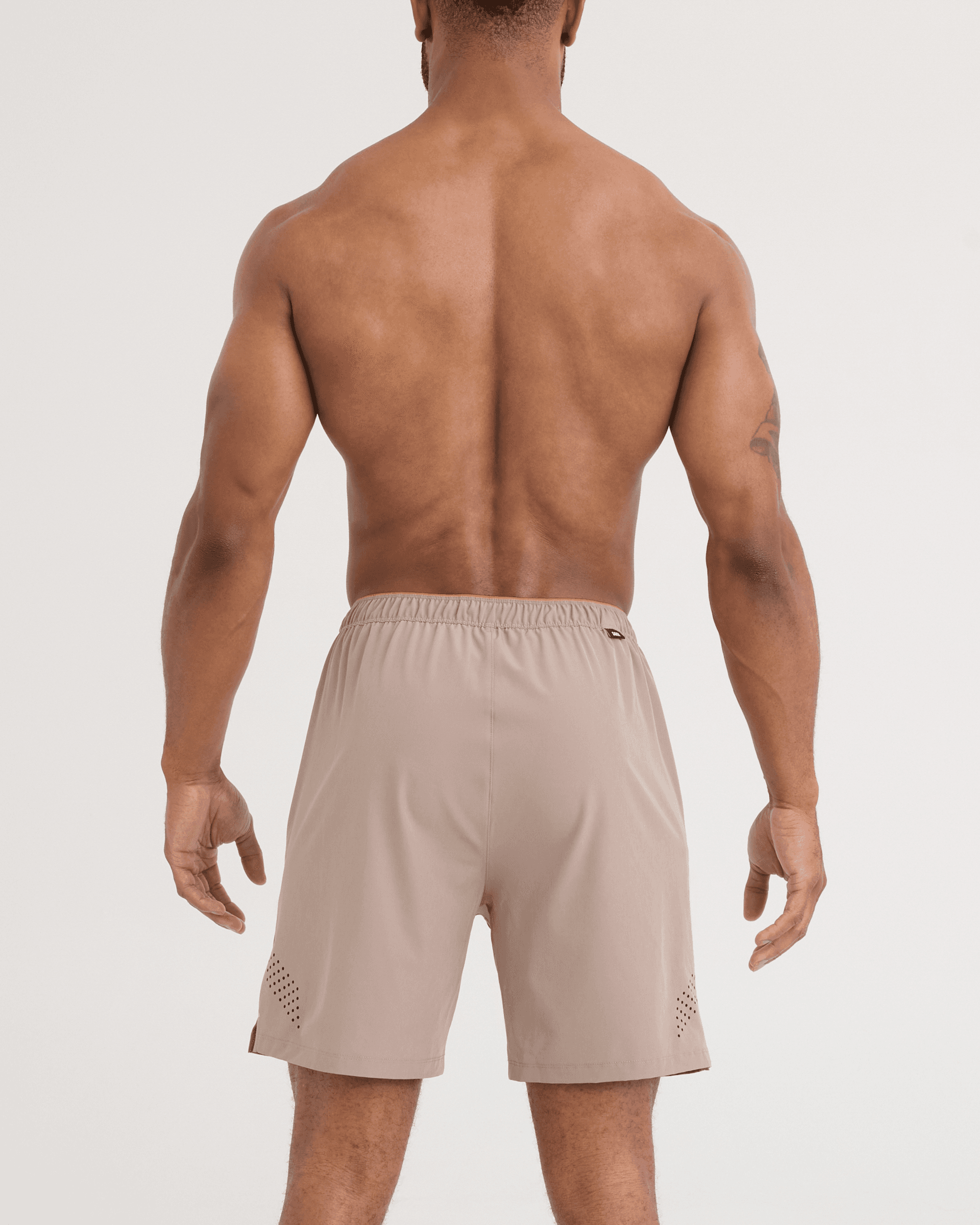Back - Model wearing Power Moves 2N1 Shorts 7" in Cinder