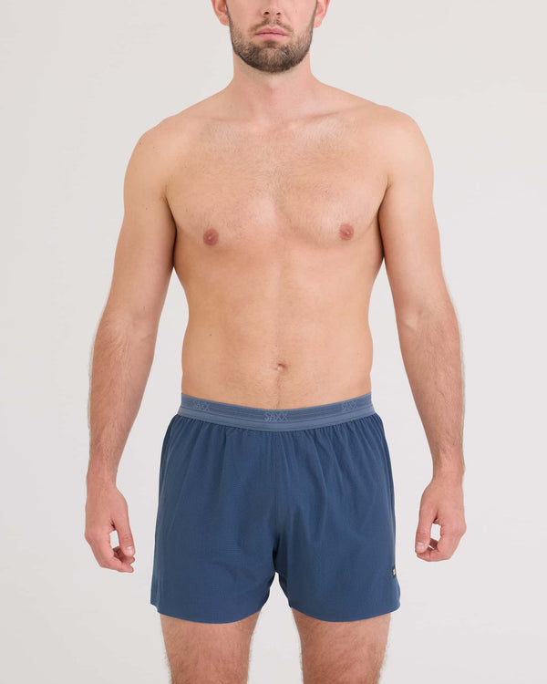 Front - Model wearing Race Pace 2N1 Run Short 5" in Washed Indigo