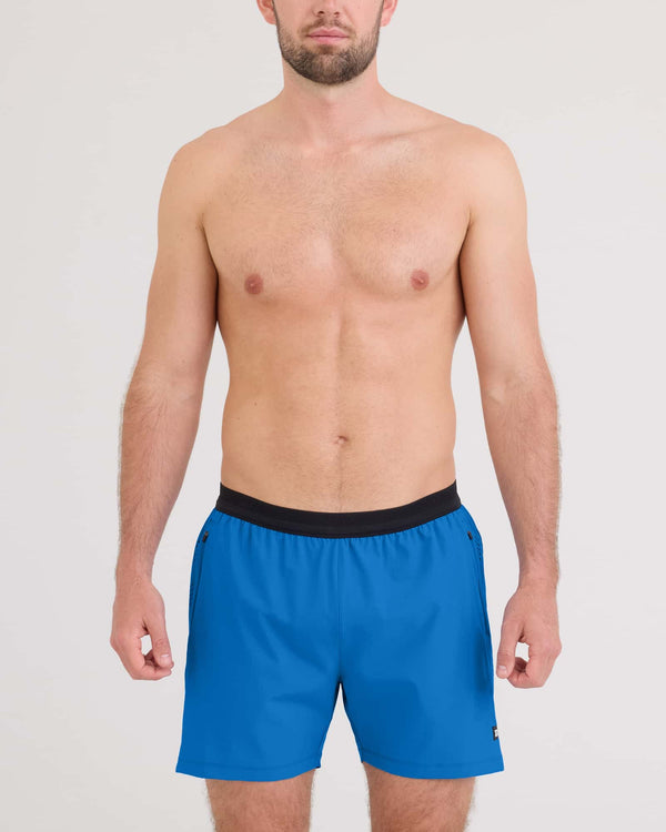 Front - Model wearing Run For All 2N1 Short 5" in Bold Blue