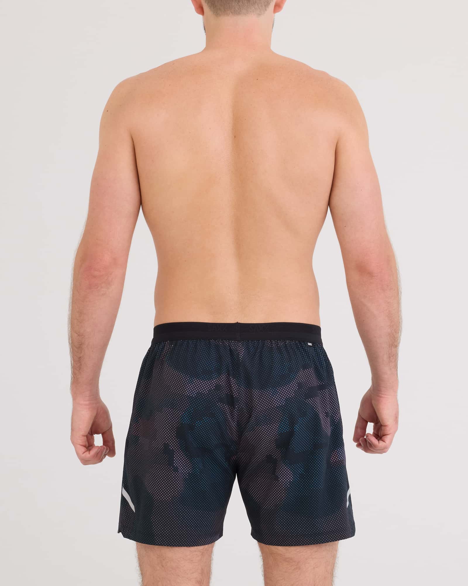 Back - Model wearing Run For All 2N1 Short 5" in Digi Camo-Multi