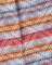 Close-up of fabric with multicolored plaid pattern