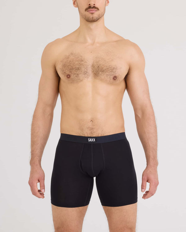 Front - Model wearing Vibe Xtra Soft Comfort Long Boxer Brief Fly in Black