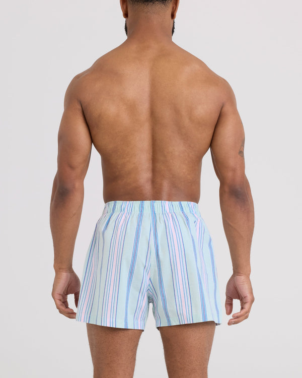 Back - Model wearing DropTemp Cooling Cotton Boxer Short in Upbeat Stripe-Icy Shore