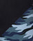 Close-up of blue camouflage pattern on a dark background